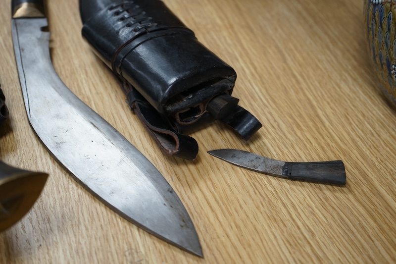 Two leather cased kukri, 43cm long. Condition - good